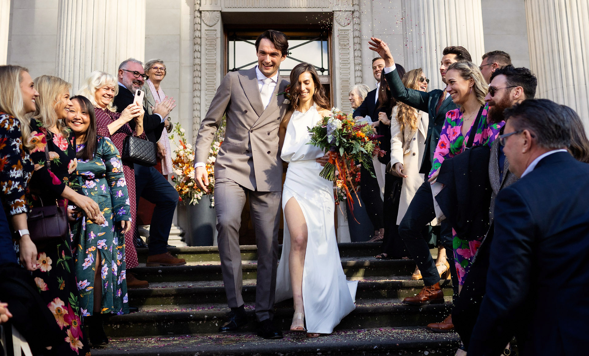 Marylebone Town Hall Wedding - Couple exiting to confetti