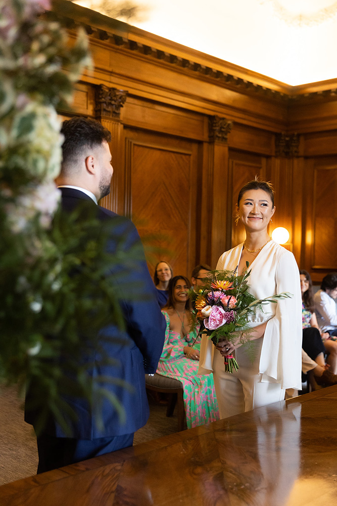 Bride and groom getting married in the Westminster Room at Marylebone Town Hall.